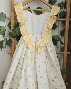 Vestido para niña estampado limones. espalda descubierta. Amarillo