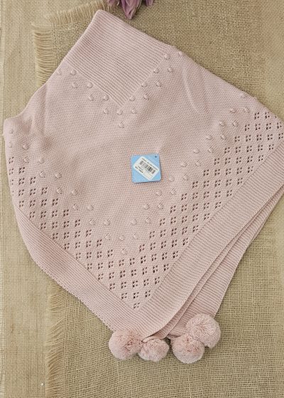 Toquilla punto borlones rosa maquillaje. Sardón